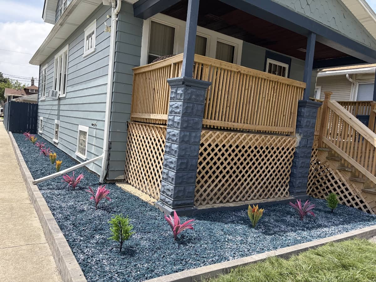 new wood deck and blue mulch installation